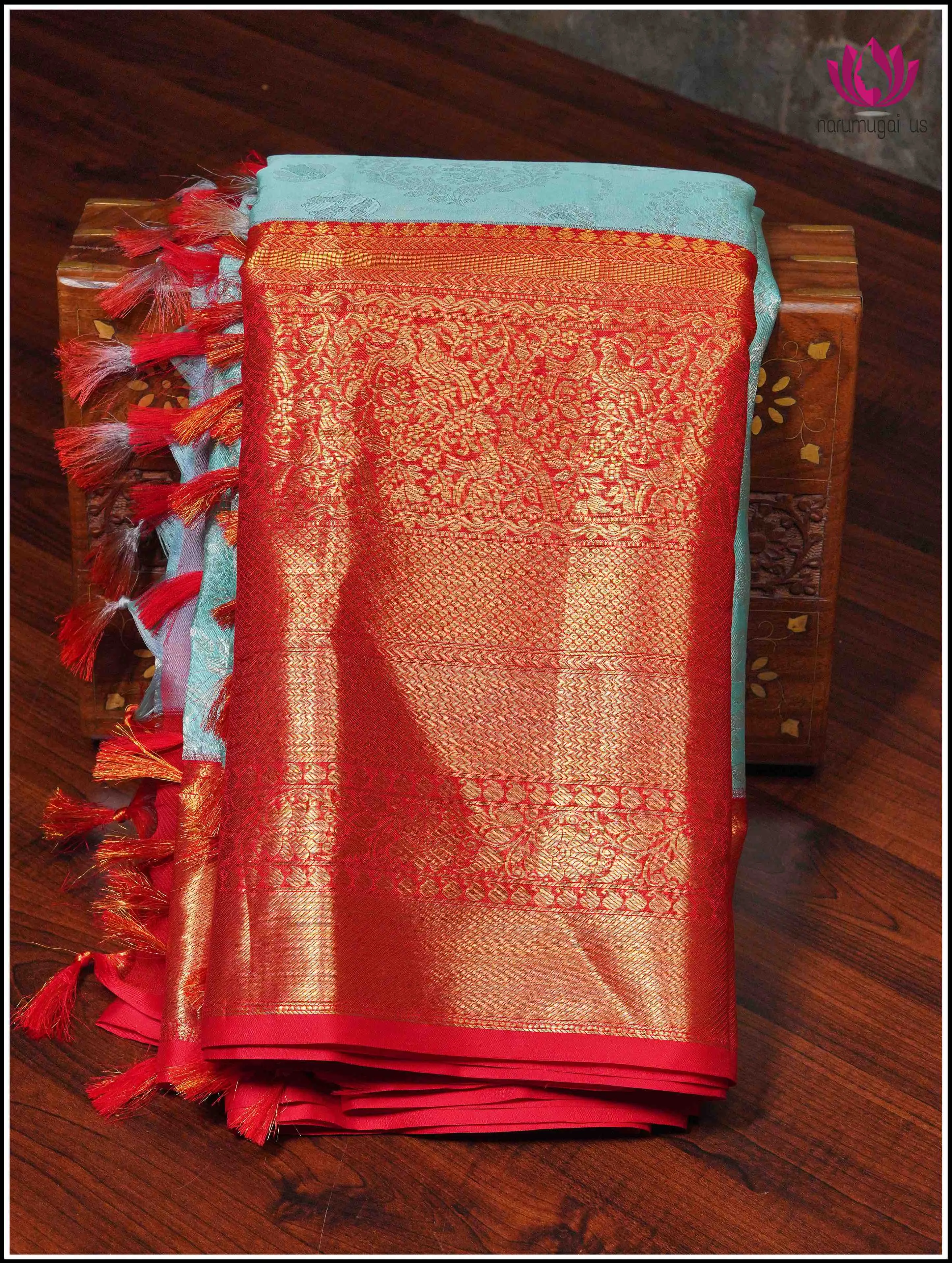 Kanchipuram Silk Saree in Light Green with Red Border with Silver and Gold Zari - Silk Mark Certified