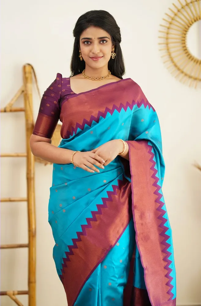 Lissome Firozi Soft Silk Saree With Captivating Blouse Piece